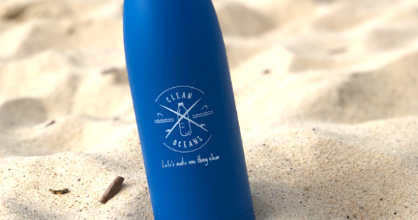 Blue Clean Oceans bottle in sand